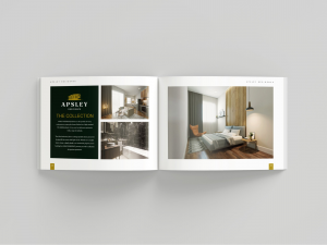 A closeup of an open luxury real estate brochure with large images of bedrooms from the Apsley Residence